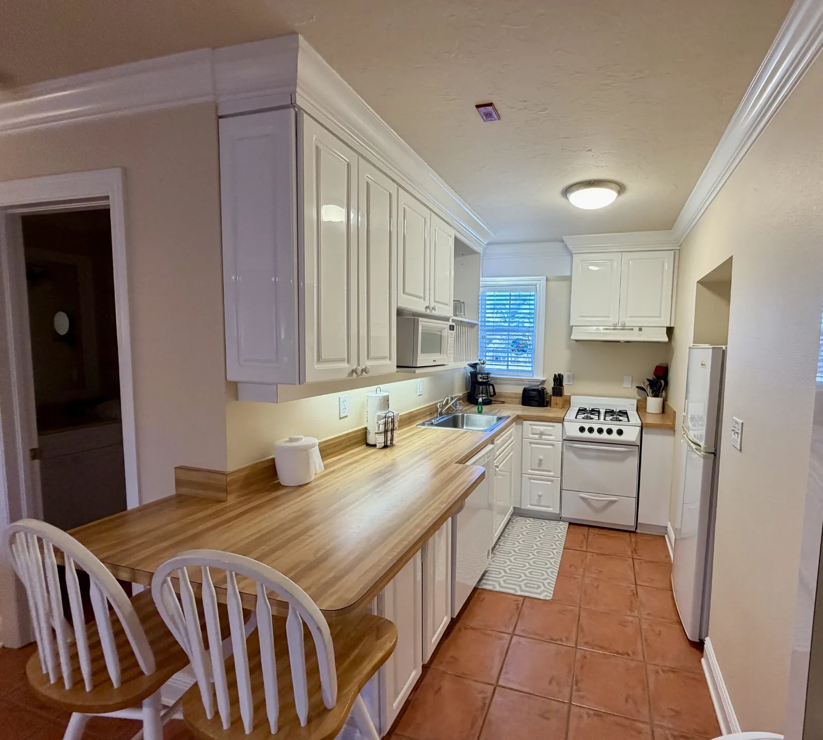 Kitchen in hotel style beach room