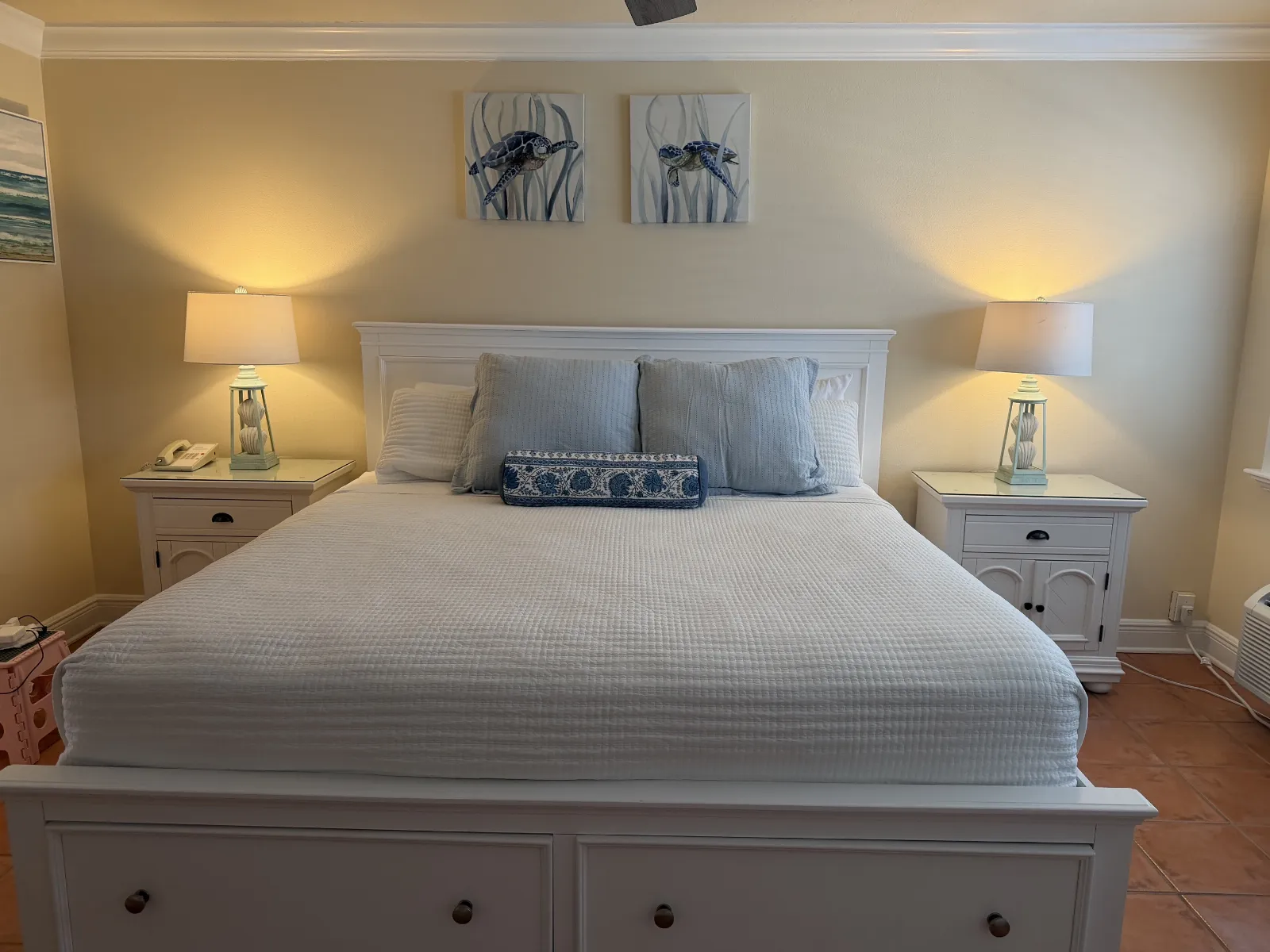 New light blue pillows on king size bed