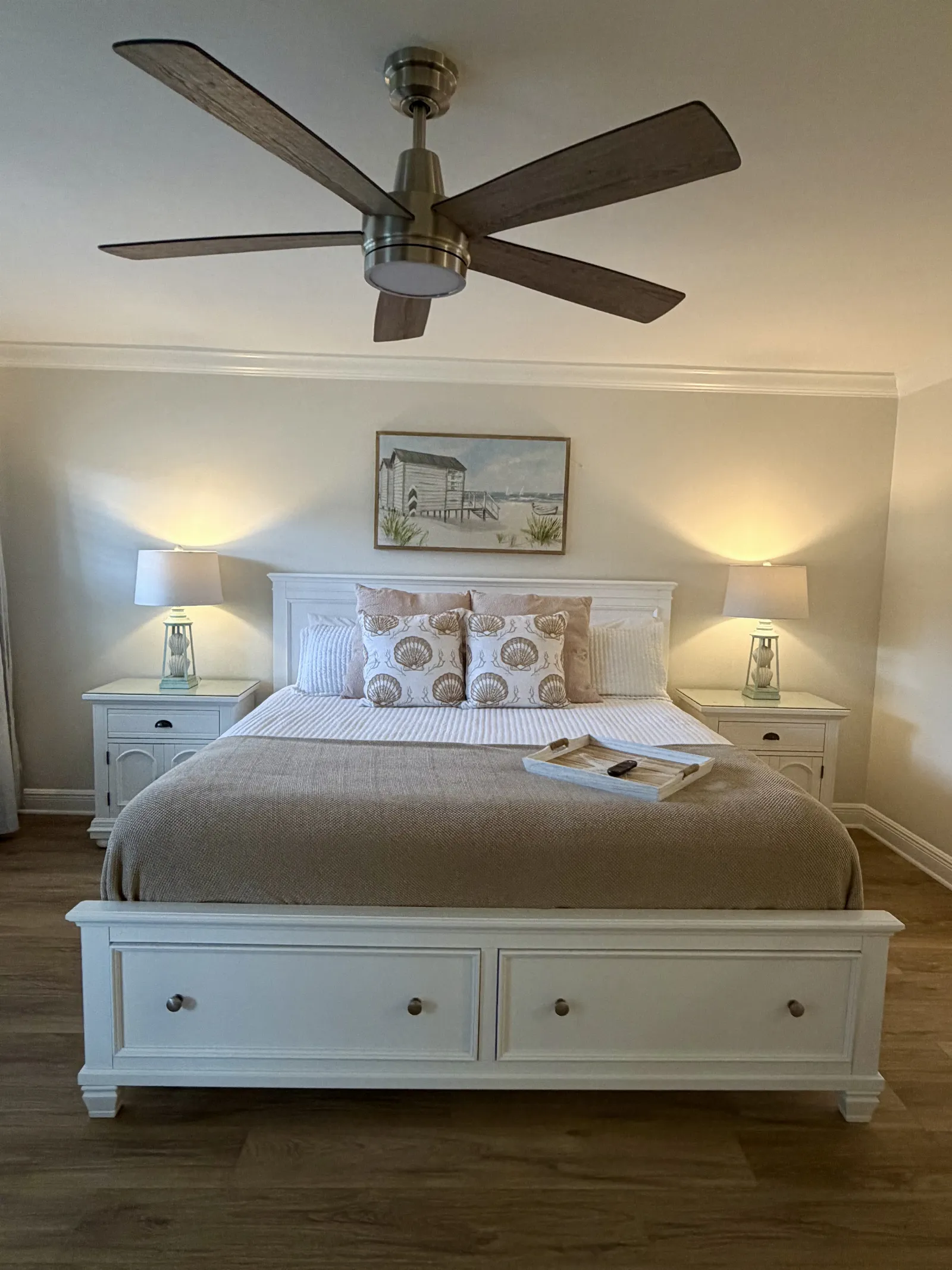 Unit 248A "The Sands" featuring a king size bed with decor pillows