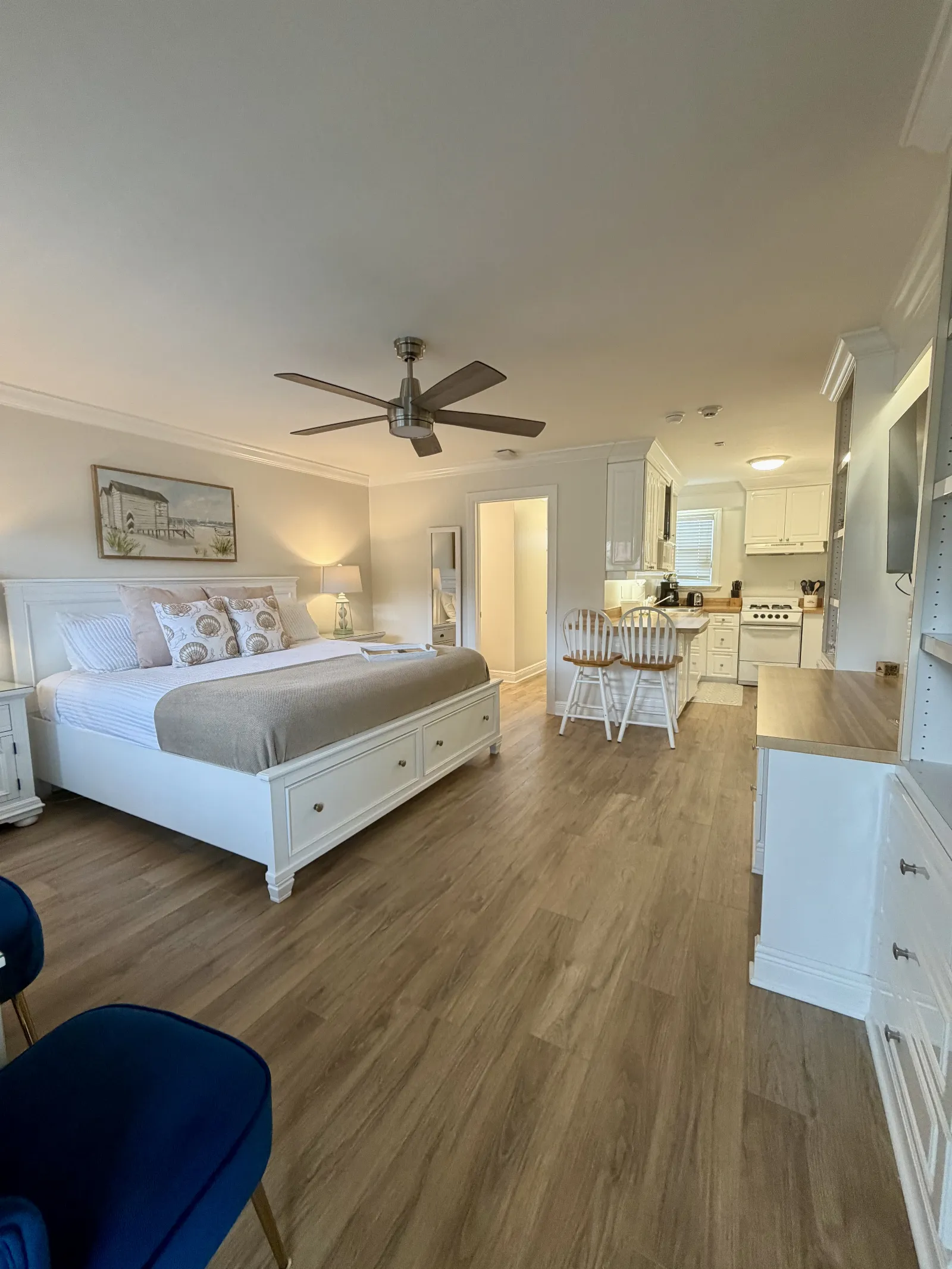 Unit 248A "The Sands" view of the entire room king bed and kitchen