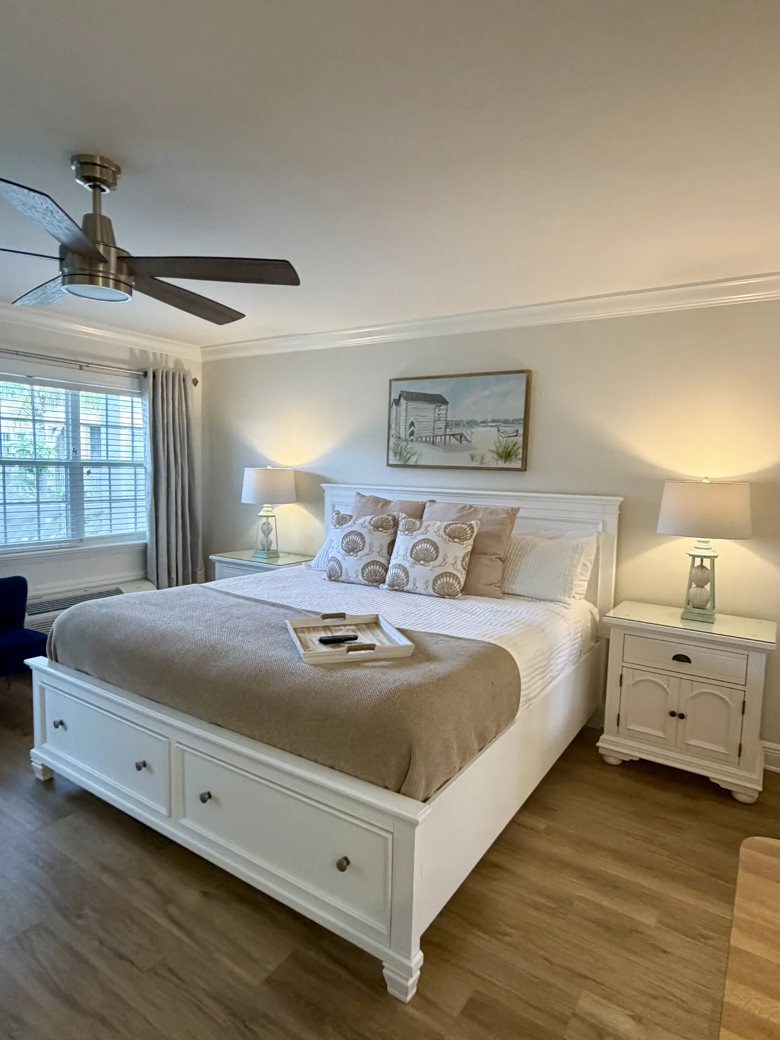 Unit 248A called "The Sands" side view of king bed with decor