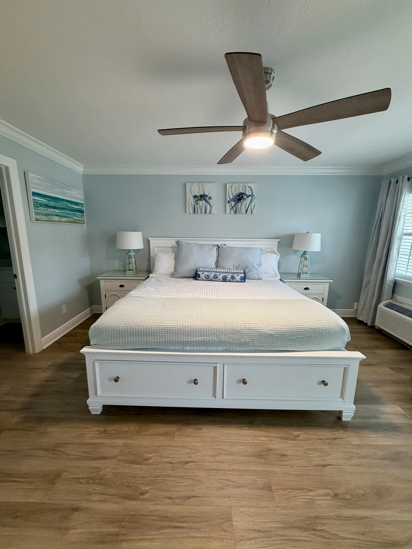 Unit 248B called "The Sands" king size bed with decor pillows
